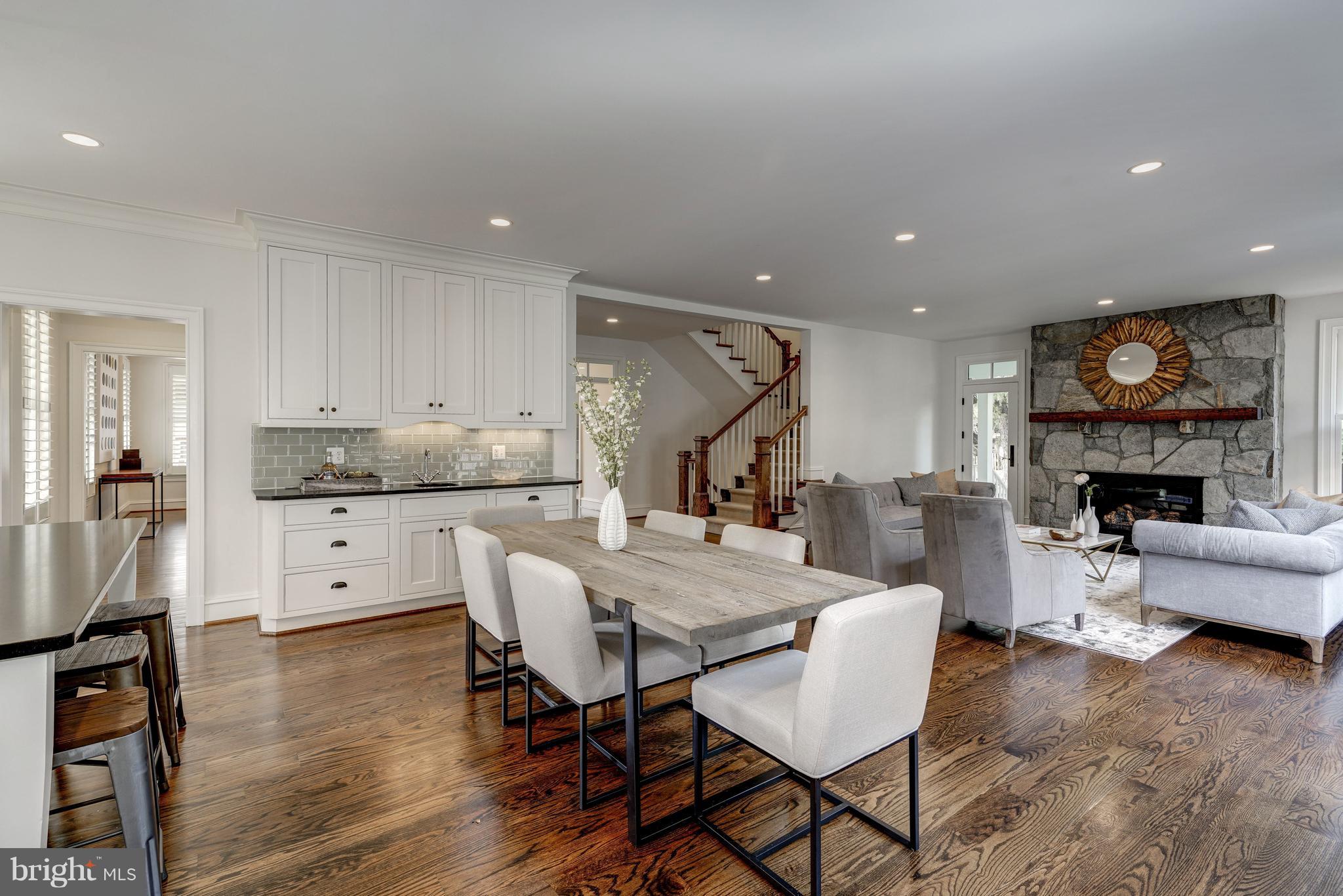 3007 North Rochester Street Arlington, VA 22213 - Photo 11 of 43 a large kitchen with a table and chairs
