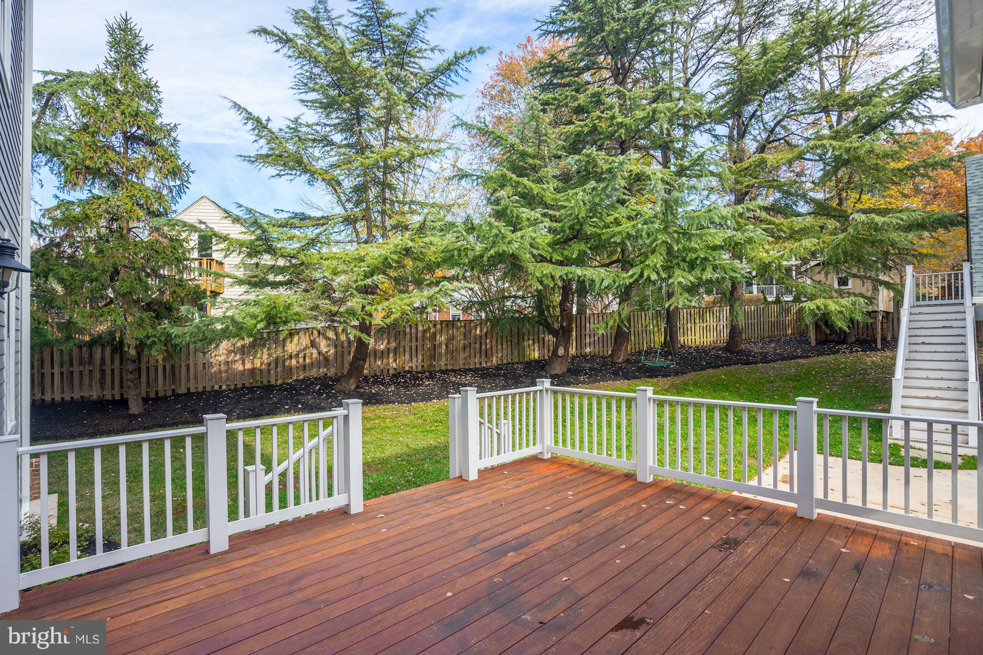3007 North Rochester Street Arlington, VA 22213 - Photo 16 of 43 a view of a deck with a large yard