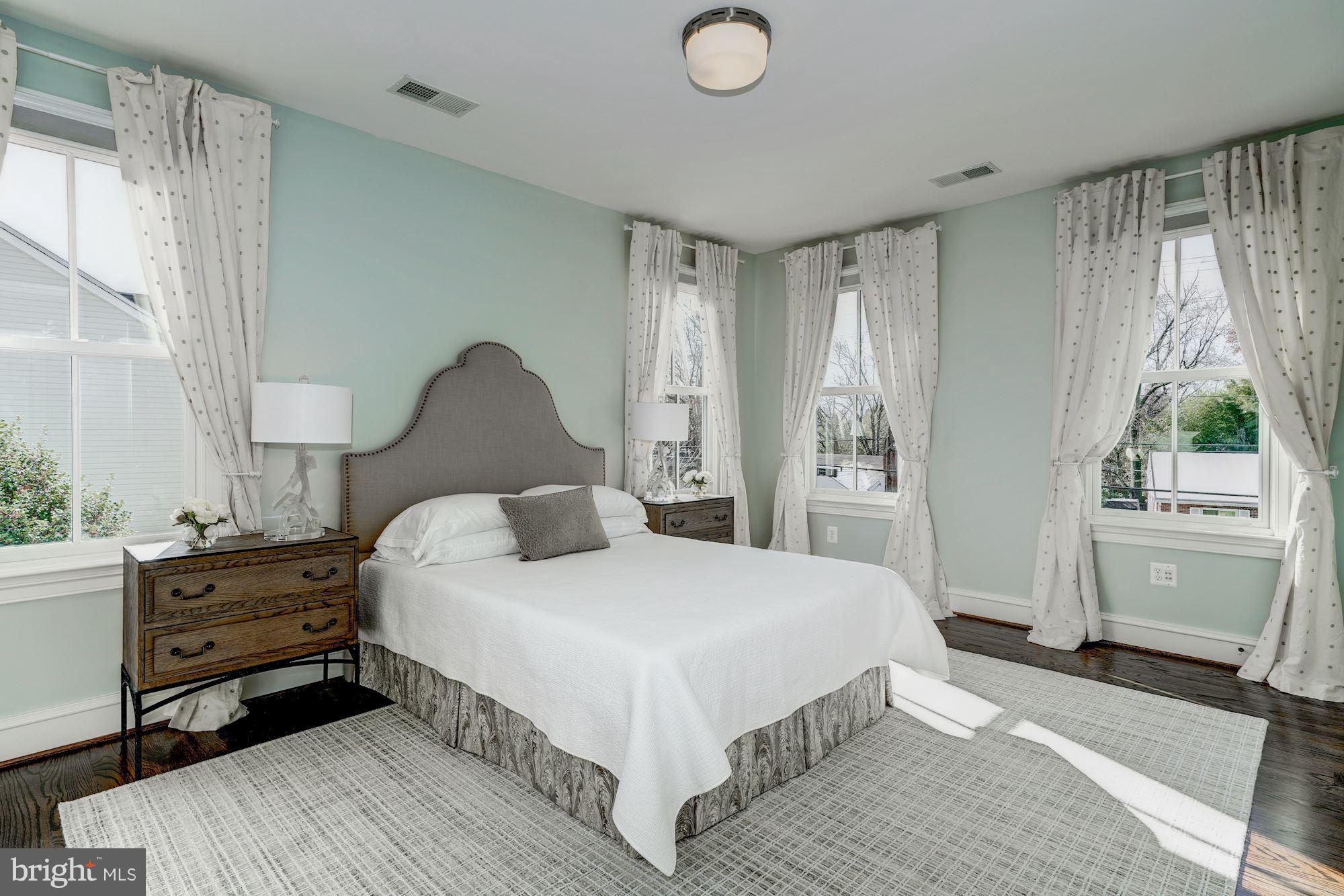 3007 North Rochester Street Arlington, VA 22213 - Photo 26 of 43 a bedroom with a large bed and a window