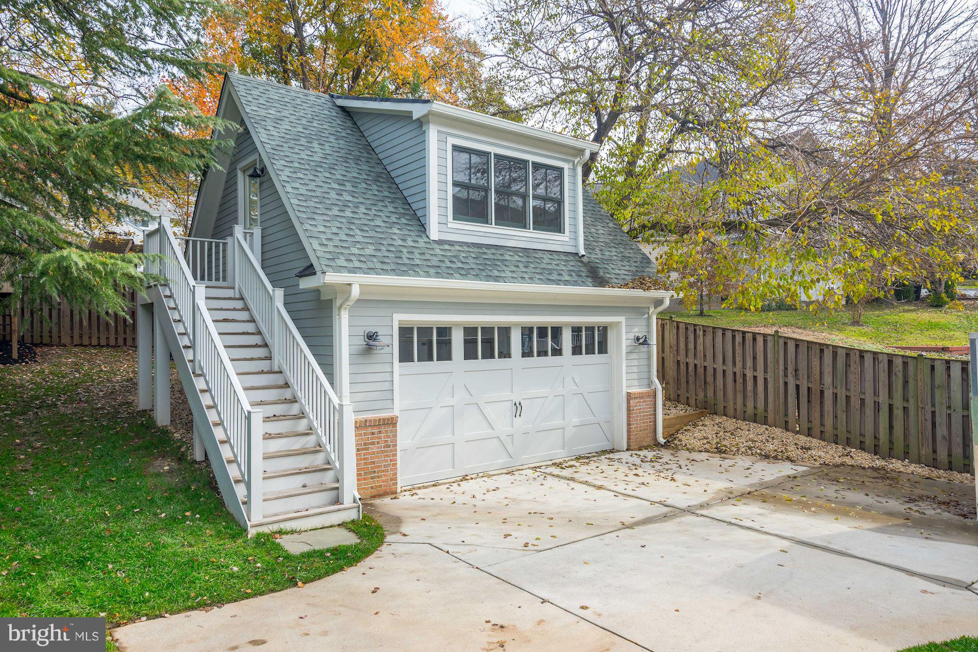 3007 North Rochester Street Arlington, VA 22213 - Photo 40 of 43 a front view of a house with a garden