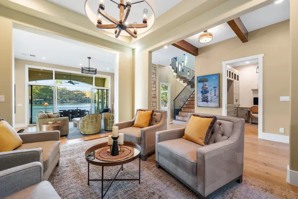 a bathroom with double vanity sinks and a mirror