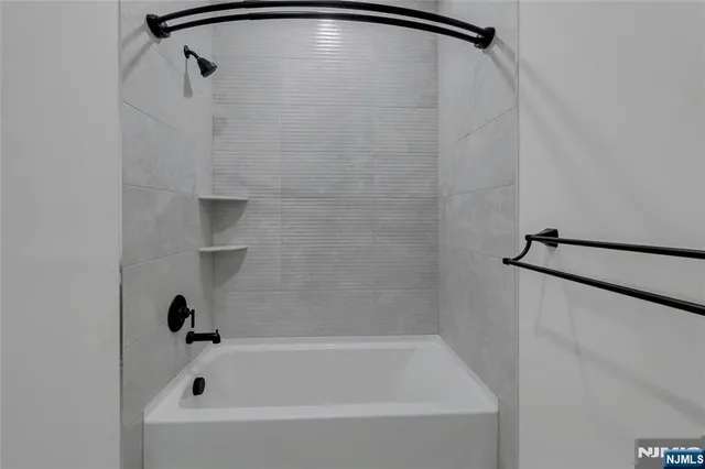 a bathroom with a bathtub