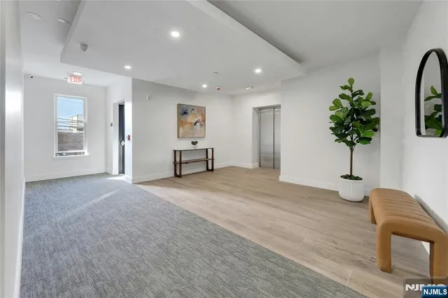 a view of livingroom with furniture and window