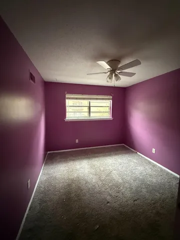 a house with trees in front of it
