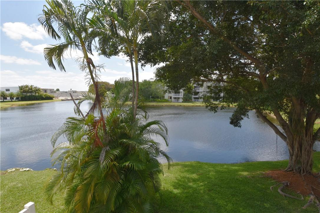 217 Riviera Circle, Unit 217 Weston, FL 33326 - Photo 20 of 58 WATER VIEW from LIVING ROOM