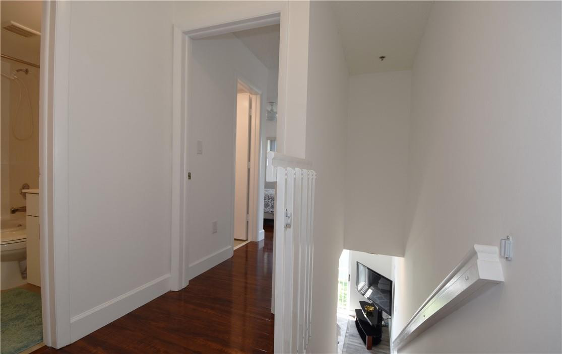 217 Riviera Circle, Unit 217 Weston, FL 33326 - Photo 23 of 58 a view of an entryway with wooden floor