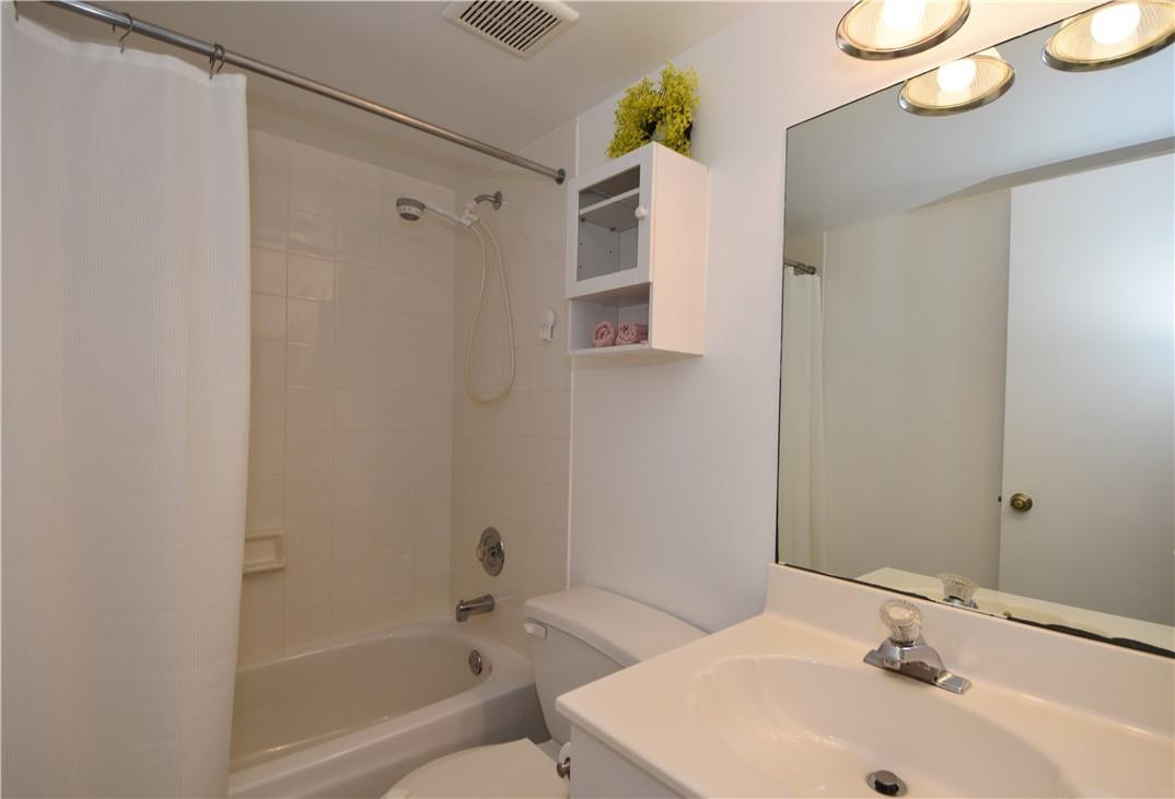 217 Riviera Circle, Unit 217 Weston, FL 33326 - Photo 36 of 58 a bathroom with a sink a toilet and shower