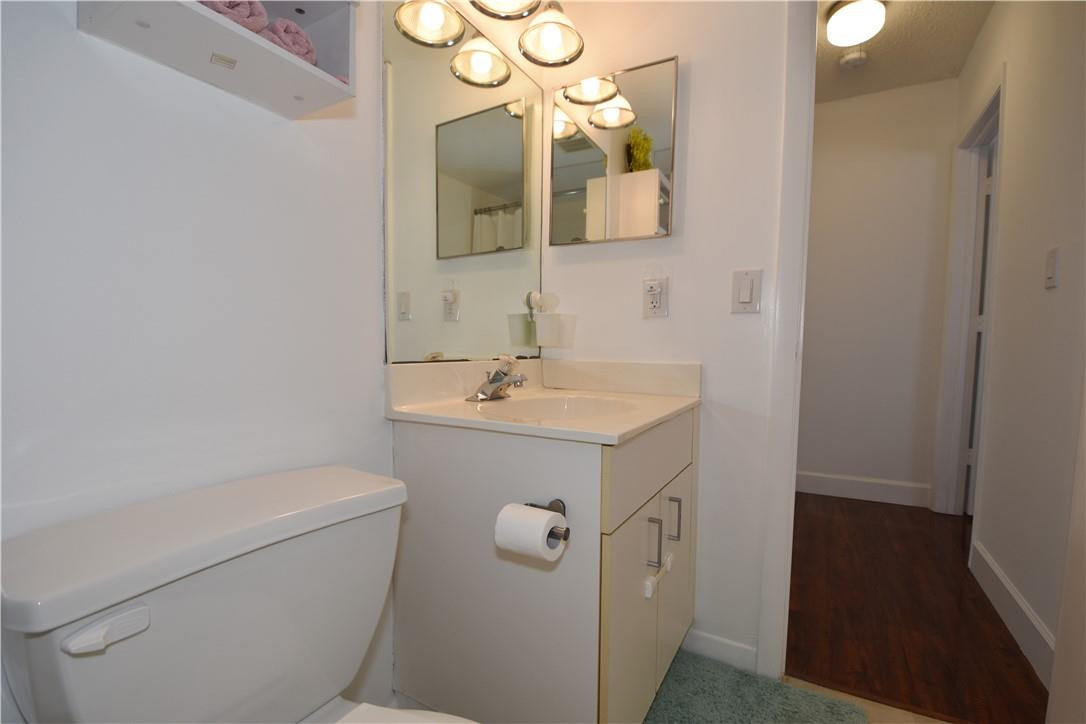 217 Riviera Circle, Unit 217 Weston, FL 33326 - Photo 37 of 58 a bathroom with a sink a toilet and shower