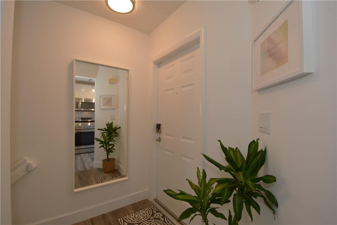 217 Riviera Circle, Unit 217 Weston, FL 33326 - Photo 38 of 58 FOYER