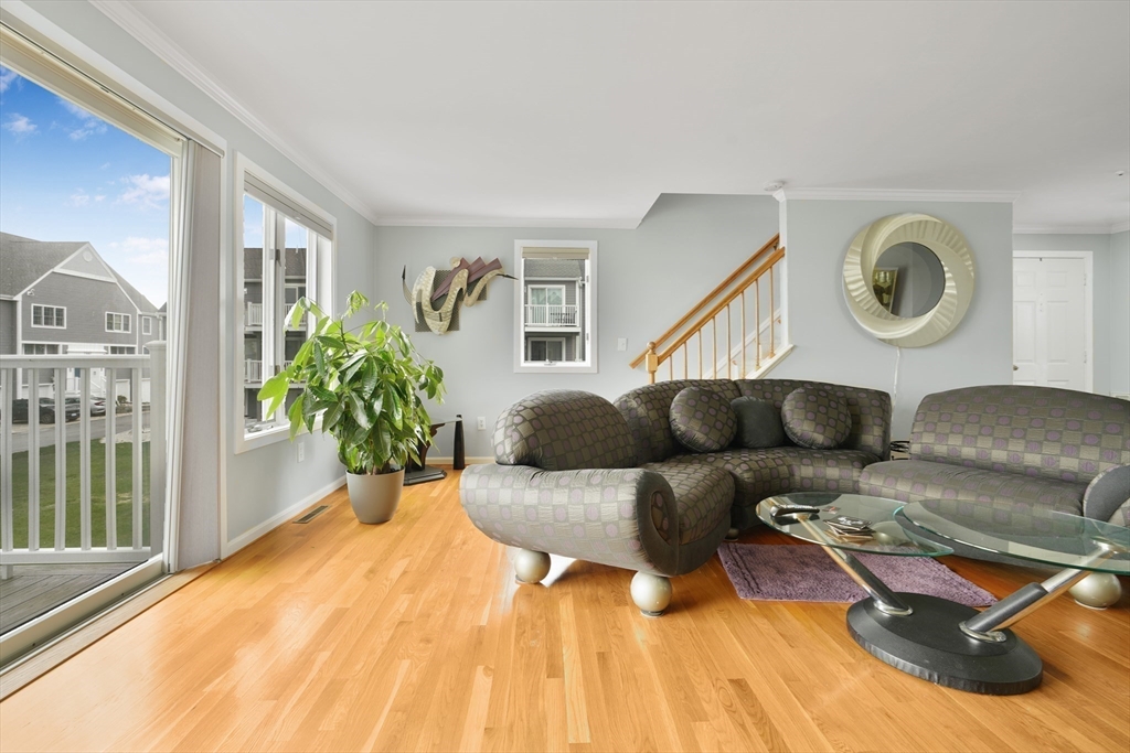 700 Shore Drive, Unit 813 Fall River, MA 02721 - Photo 11 of 29 a living room with furniture and a window