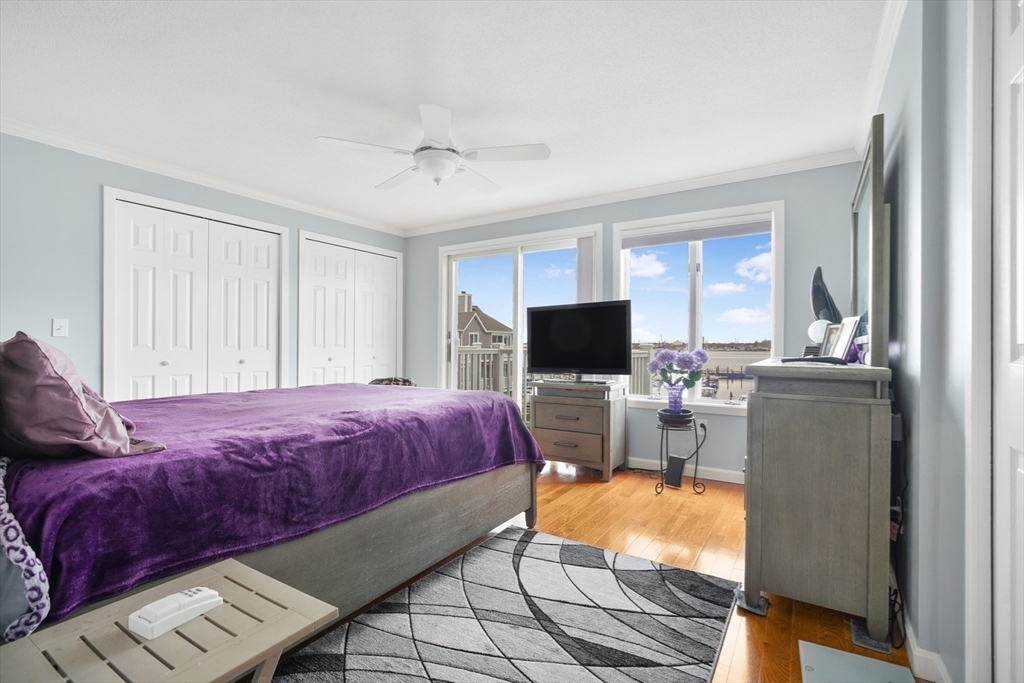 700 Shore Drive, Unit 813 Fall River, MA 02721 - Photo 13 of 29 a bedroom with a bed and a television