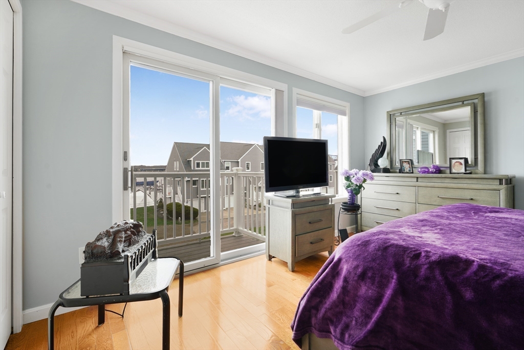 700 Shore Drive, Unit 813 Fall River, MA 02721 - Photo 14 of 29 a living room with furniture and a flat screen tv