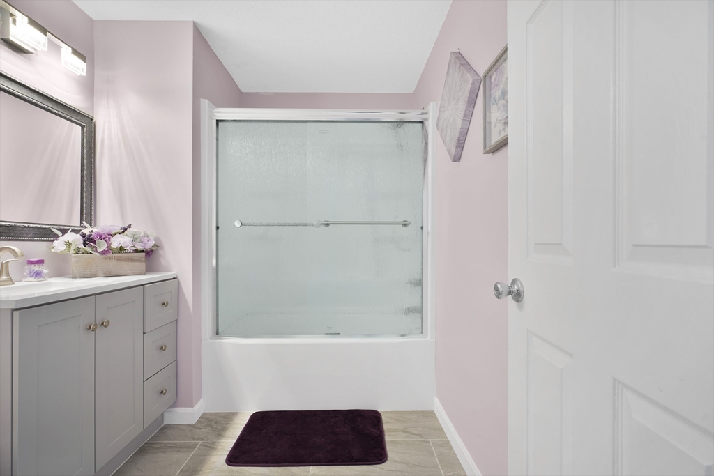 700 Shore Drive, Unit 813 Fall River, MA 02721 - Photo 17 of 29 a bathroom with a bathtub and a shower