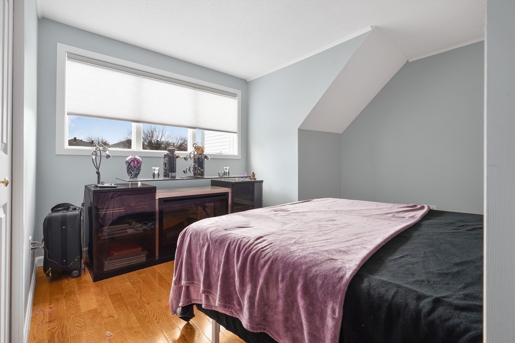 700 Shore Drive, Unit 813 Fall River, MA 02721 - Photo 18 of 29 a bedroom with a bed and a window