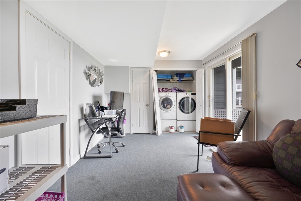 700 Shore Drive, Unit 813 Fall River, MA 02721 - Photo 24 of 29 a living room with furniture and a window