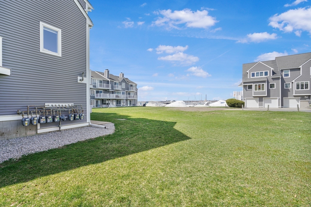 700 Shore Drive, Unit 813 Fall River, MA 02721 - Photo 27 of 29 a house view with a garden space