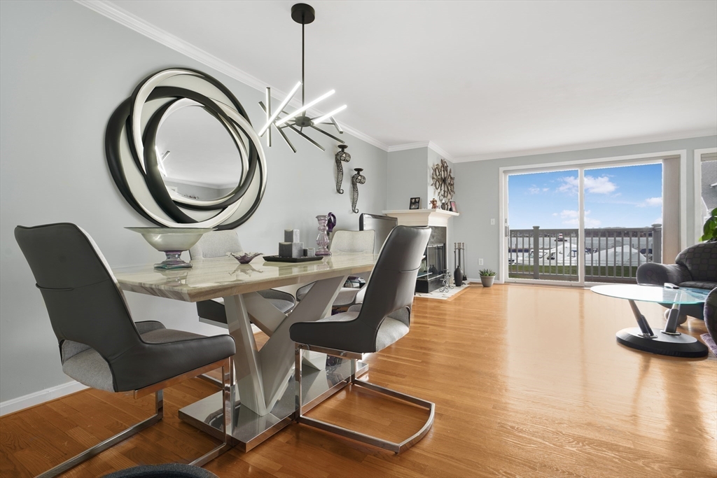 700 Shore Drive, Unit 813 Fall River, MA 02721 - Photo 8 of 29 a view of a dining room with furniture and a large window