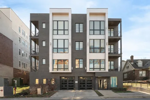 a front view of a multi story building