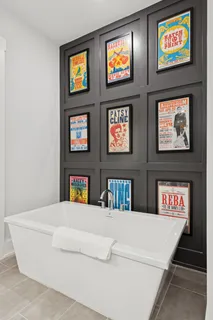 a bathroom with a granite countertop sink mirror and double