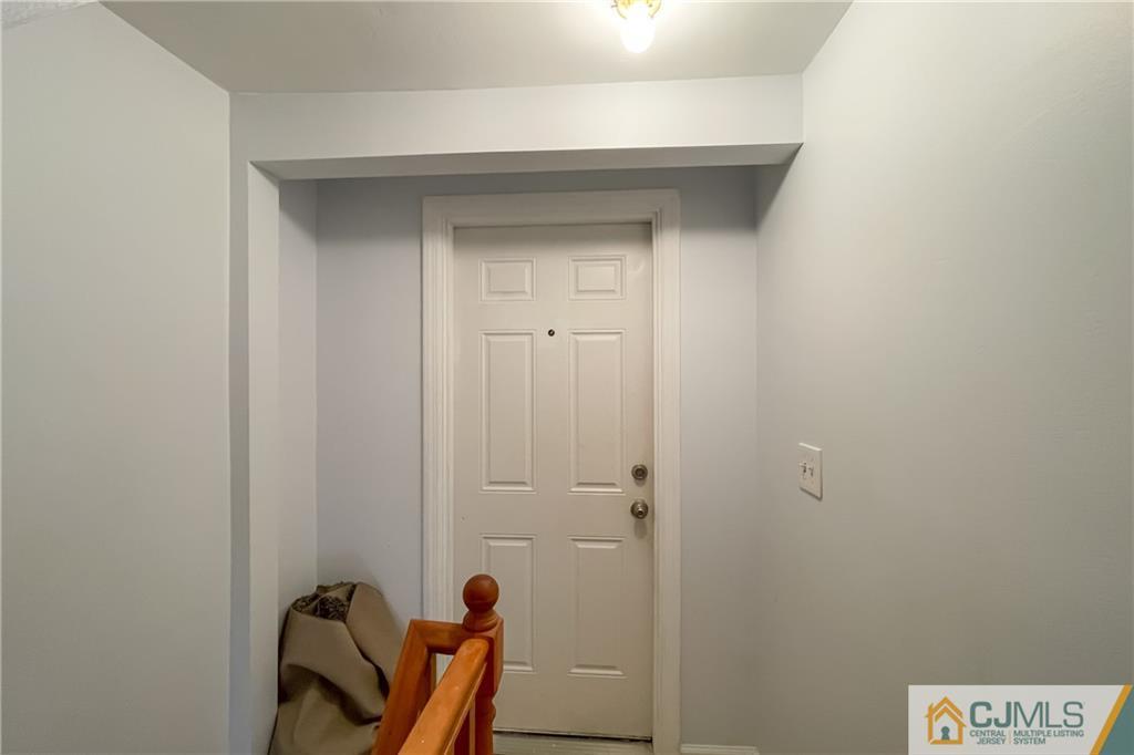 84 Guilden Street New Brunswick, NJ 08901 - Photo 19 of 27 a view of a hallway with closet
