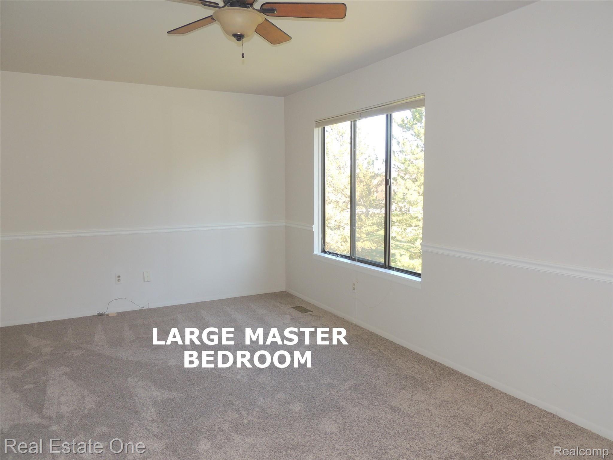 678 Tennyson, Unit 12 Rochester, MI 48307 - Photo 11 of 25 MASTER BEDROOM.JPG