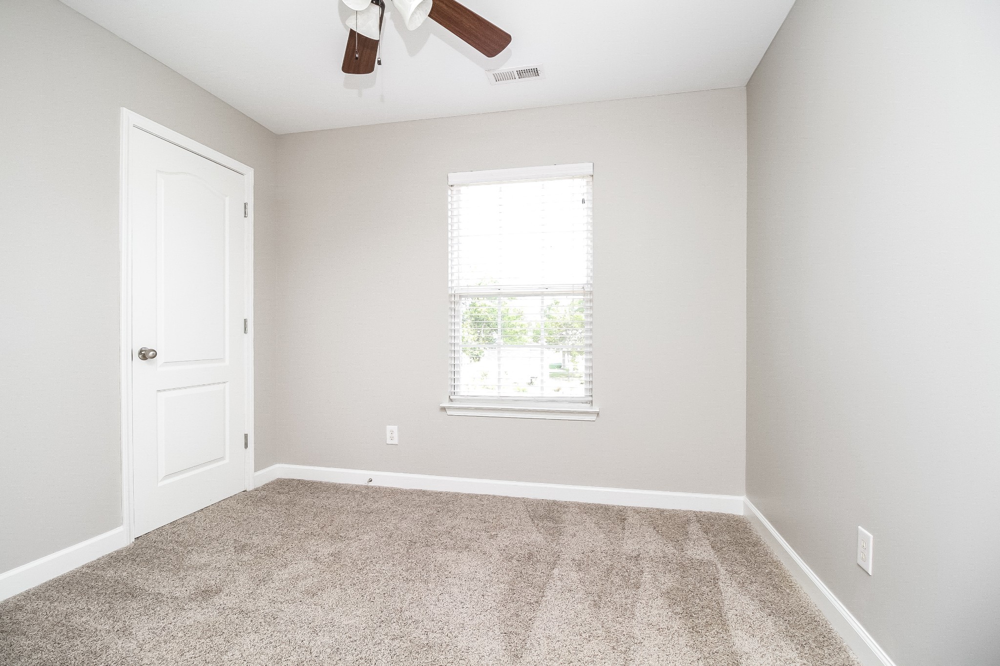 1129 Matheus Drive Murfreesboro, TN 37128 - Photo 12 of 17 an empty room with a window and a fan