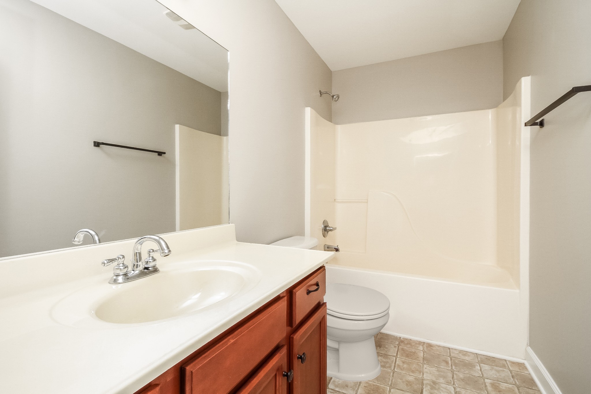 1129 Matheus Drive Murfreesboro, TN 37128 - Photo 14 of 17 a bathroom with a sink a toilet and shower