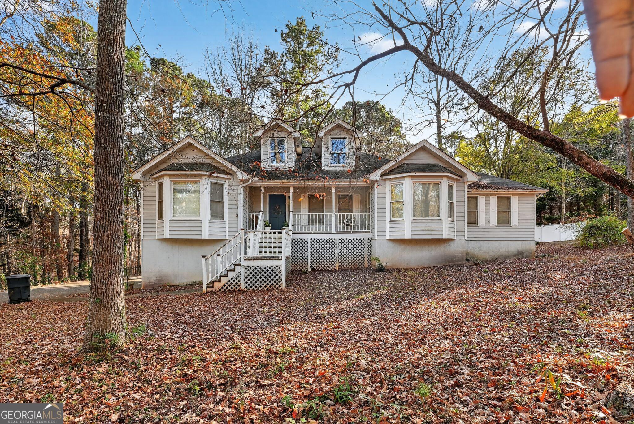 401 The Farm Road McDonough, GA 30252 - Photo 1 of 29 a front view of a house with a yard