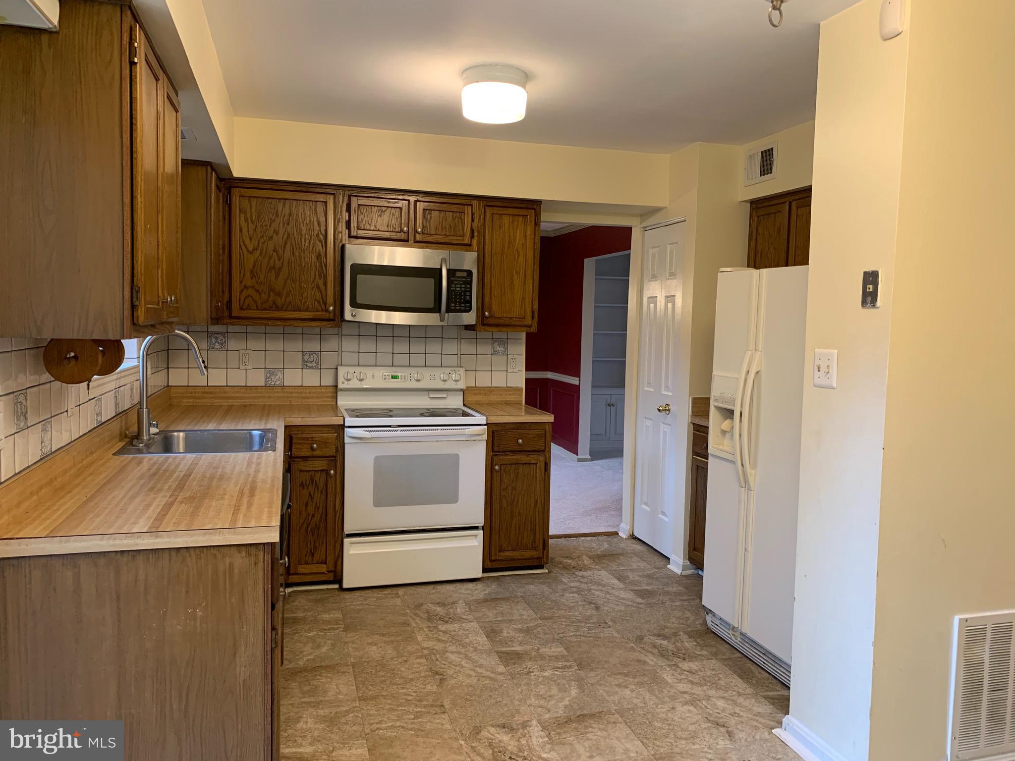 1620 Mithering Lane Silver Spring, MD 20905 - Photo 9 of 47 Kitchen