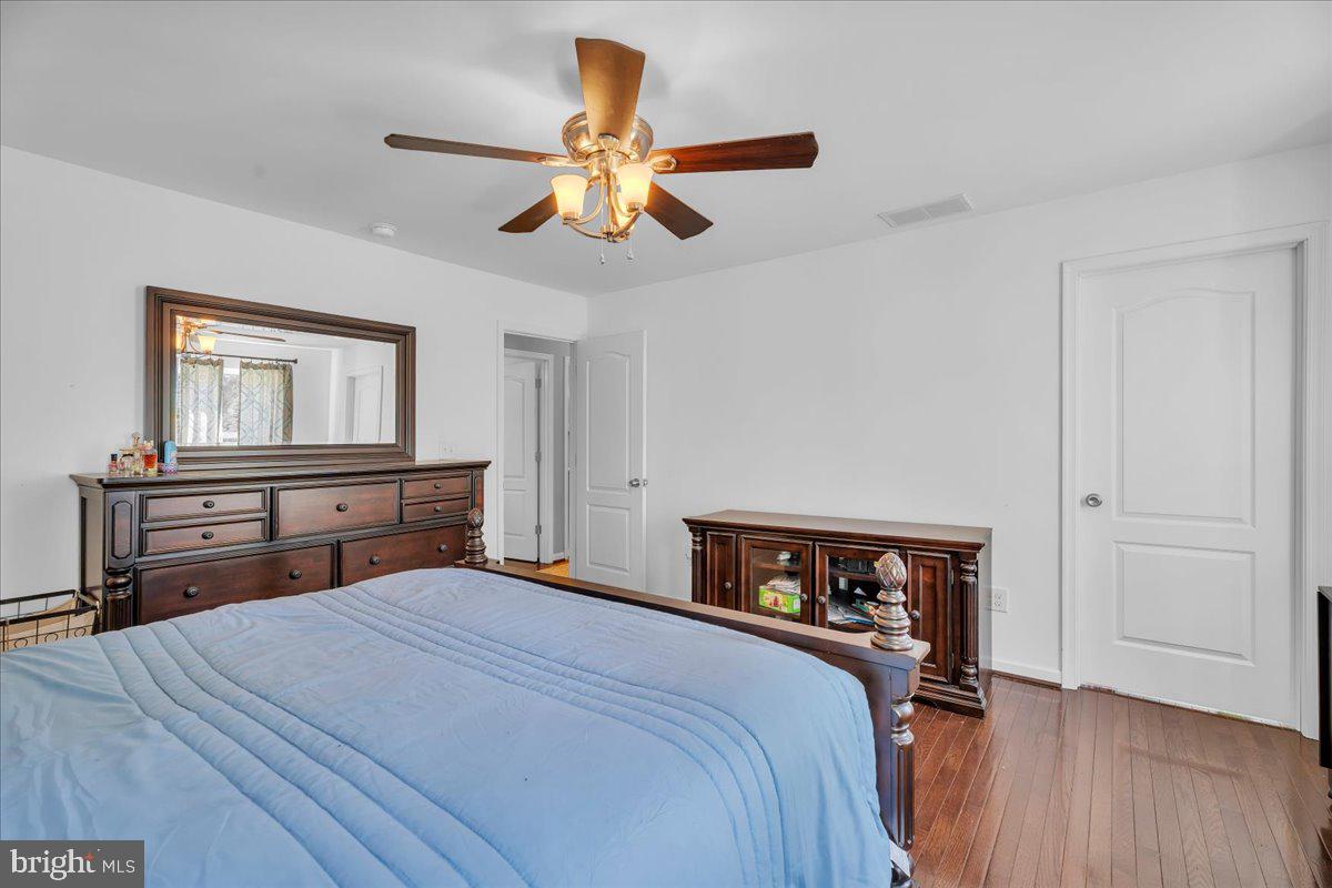 11 Evergreen Road Mount Laurel, NJ 08054 - Photo 21 of 49 Serene bedroom with warm wood accents.