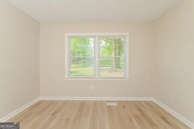 an empty room with a window