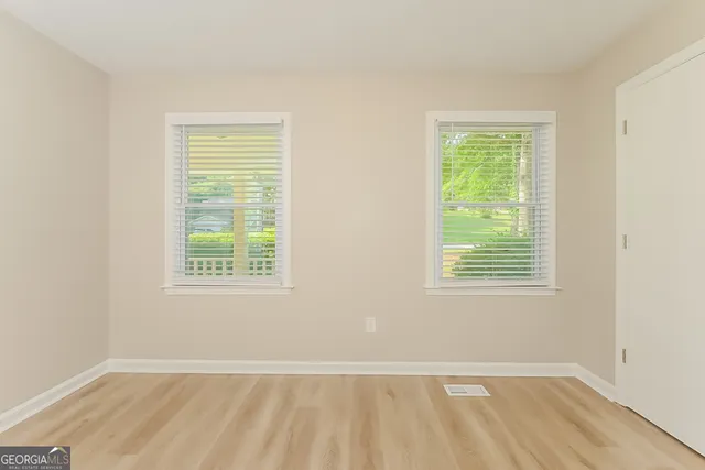 an empty room with a window