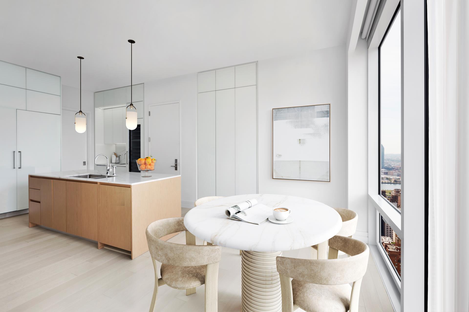 200 East 59th Street, Unit PH33/34 Manhattan, NY 10022 - Photo 5 of 20 a kitchen with a table and chairs in it