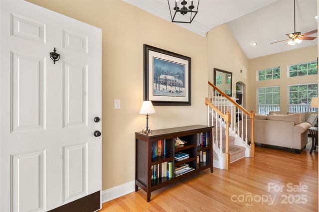a view of a hallway with seating area