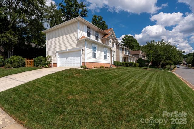 a very nice looking room with a large window and couch