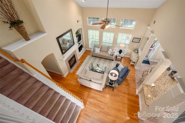 a view of living room with furniture and a large window