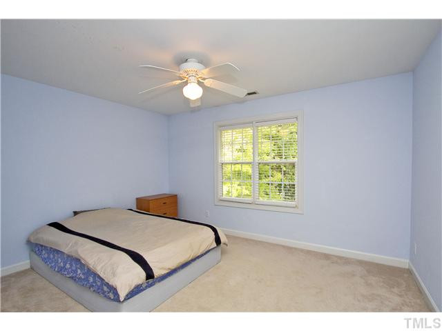 108 Jersey Ridge Road Cary, NC 27518 - Photo 18 of 24 Secondary bedrooms all have great closet space and ceiling fans. Bedroom