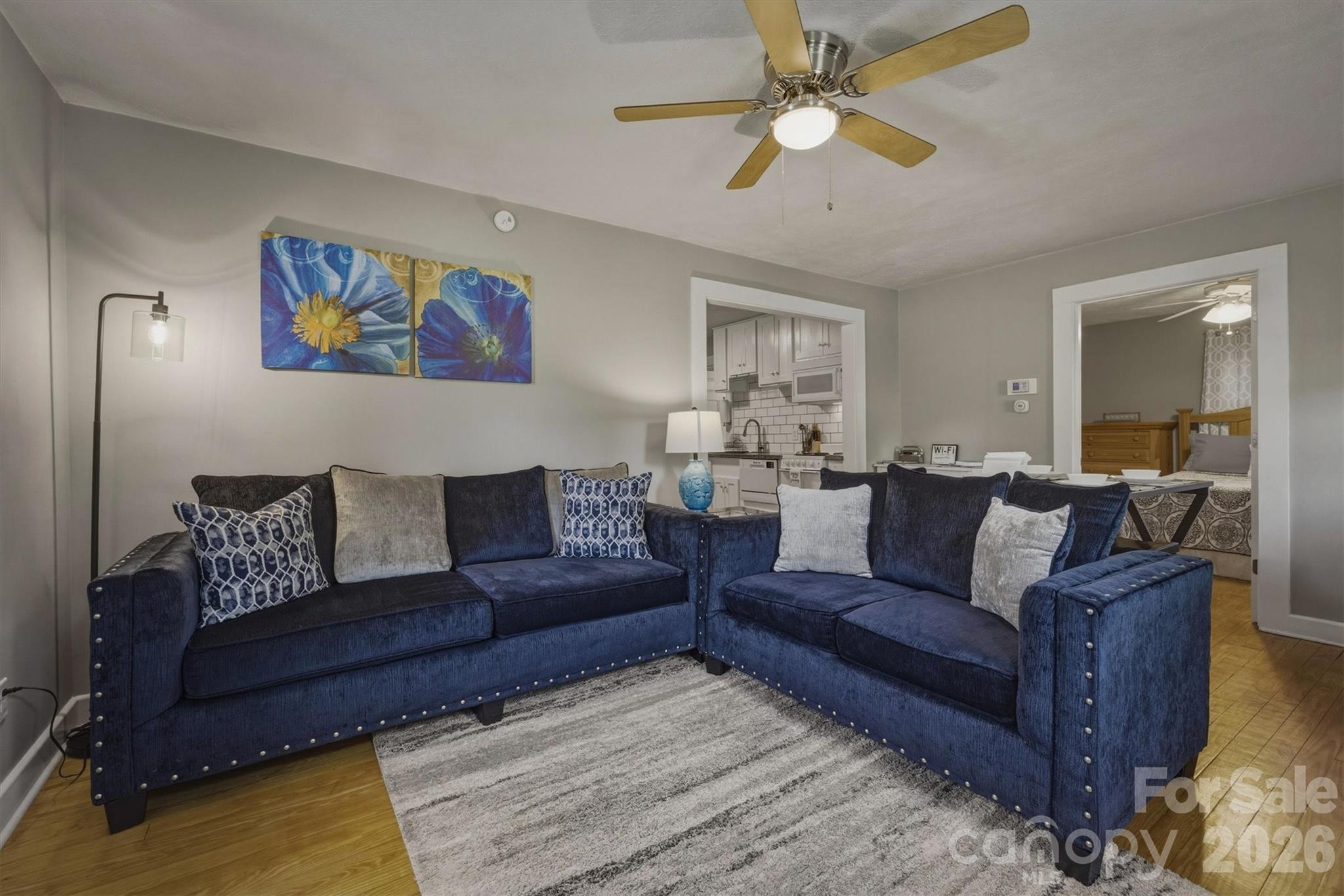 905 Carbon City Road Morganton, NC 28655 - Photo 15 of 29 a living room with furniture and a ceiling fan