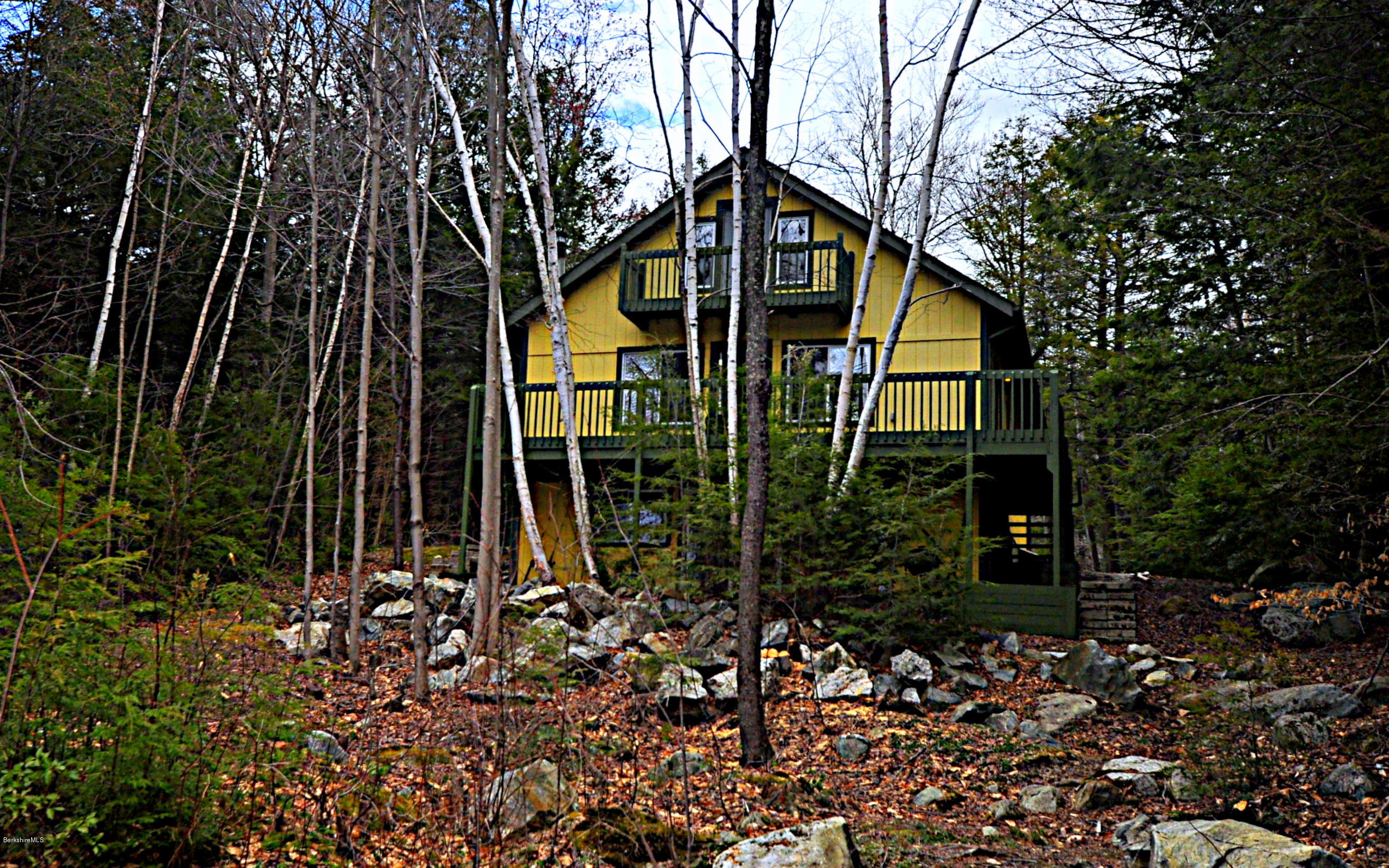 462 East Otis Road Tolland, MA 01034 - Photo 14 of 29 a view of a house with backyard and trees
