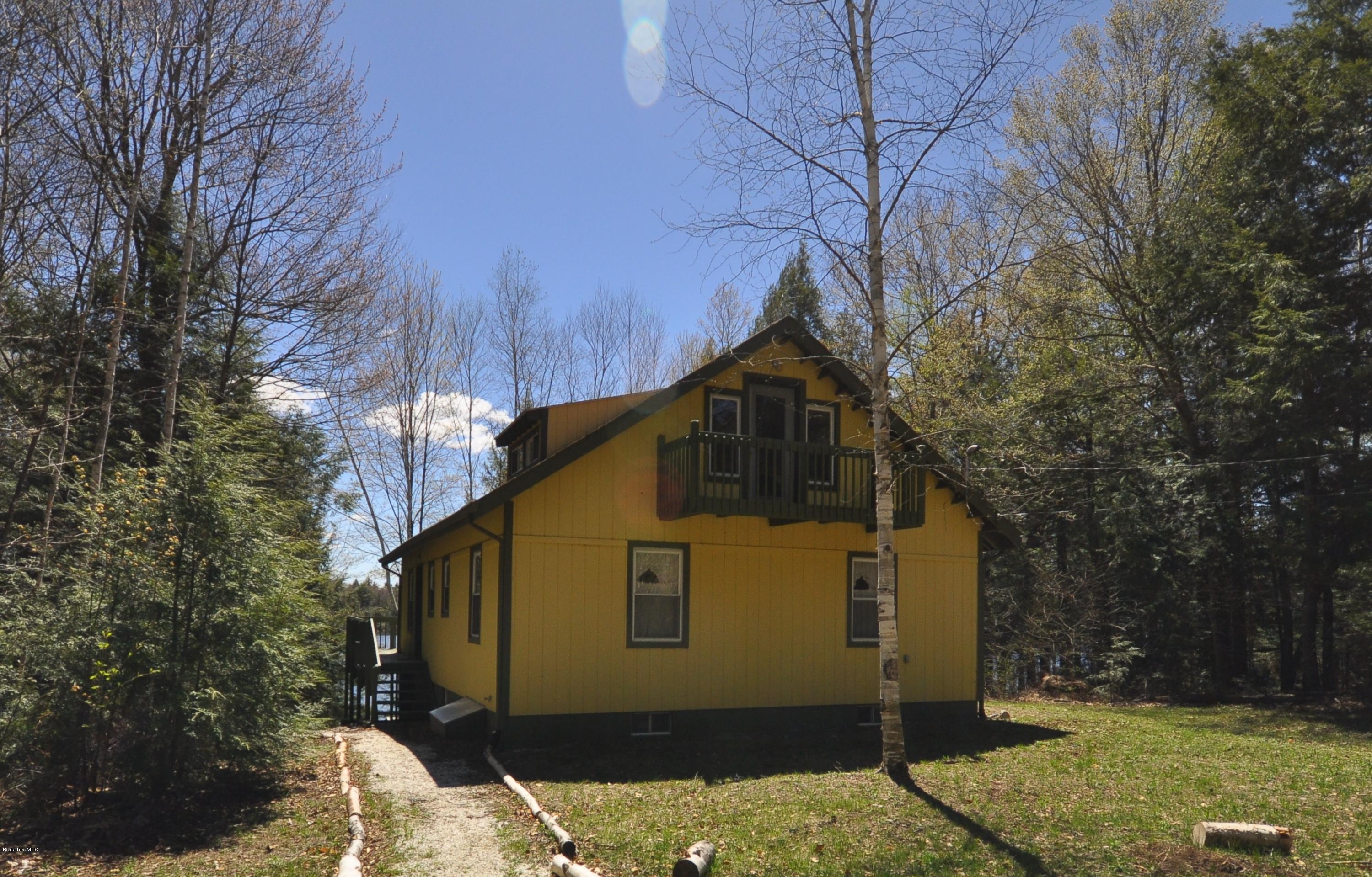 462 East Otis Road Tolland, MA 01034 - Photo 29 of 29 a front view of a house with a yard