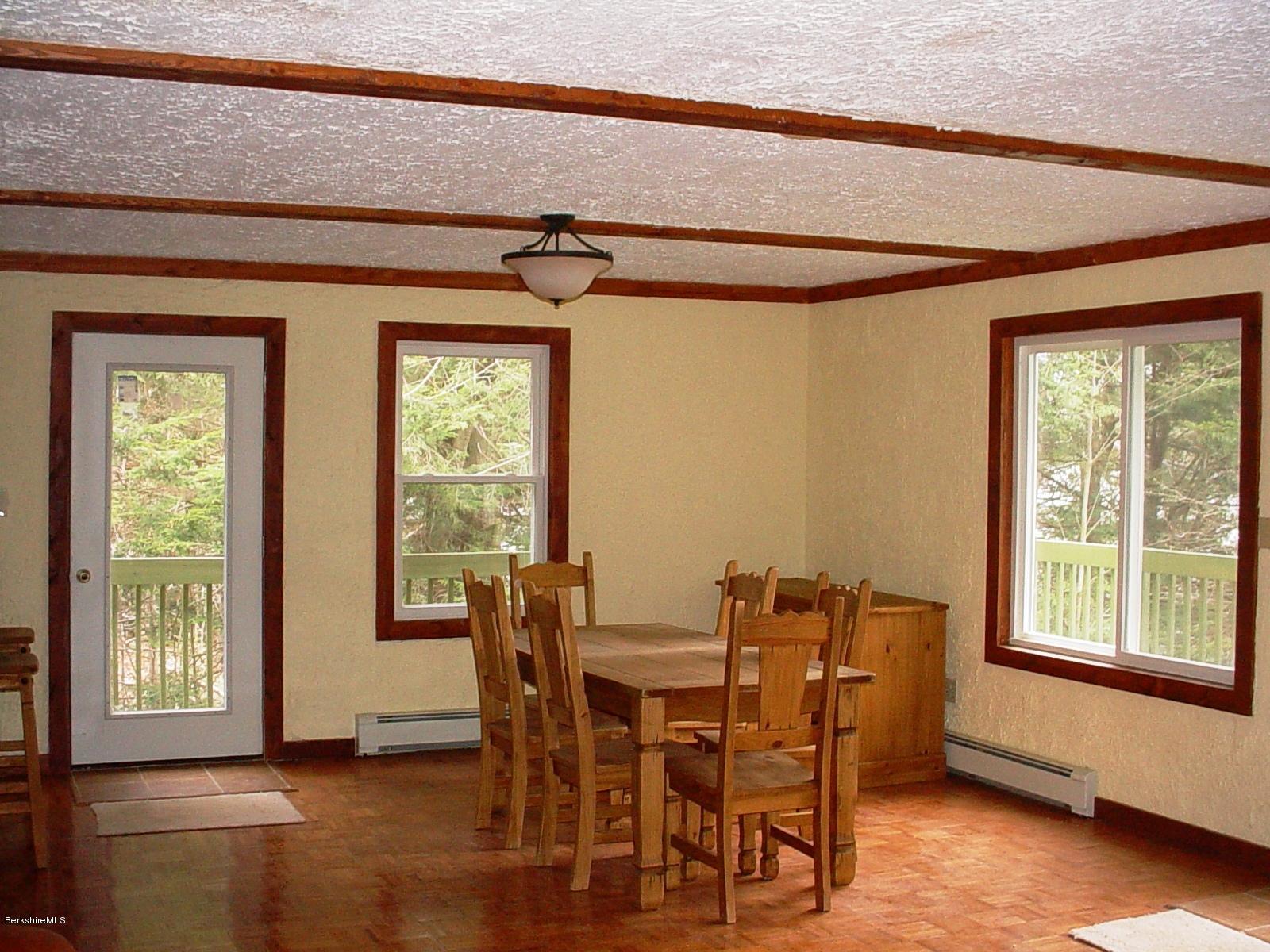 462 East Otis Road Tolland, MA 01034 - Photo 9 of 29 a view of a dining room with furniture window and outside view