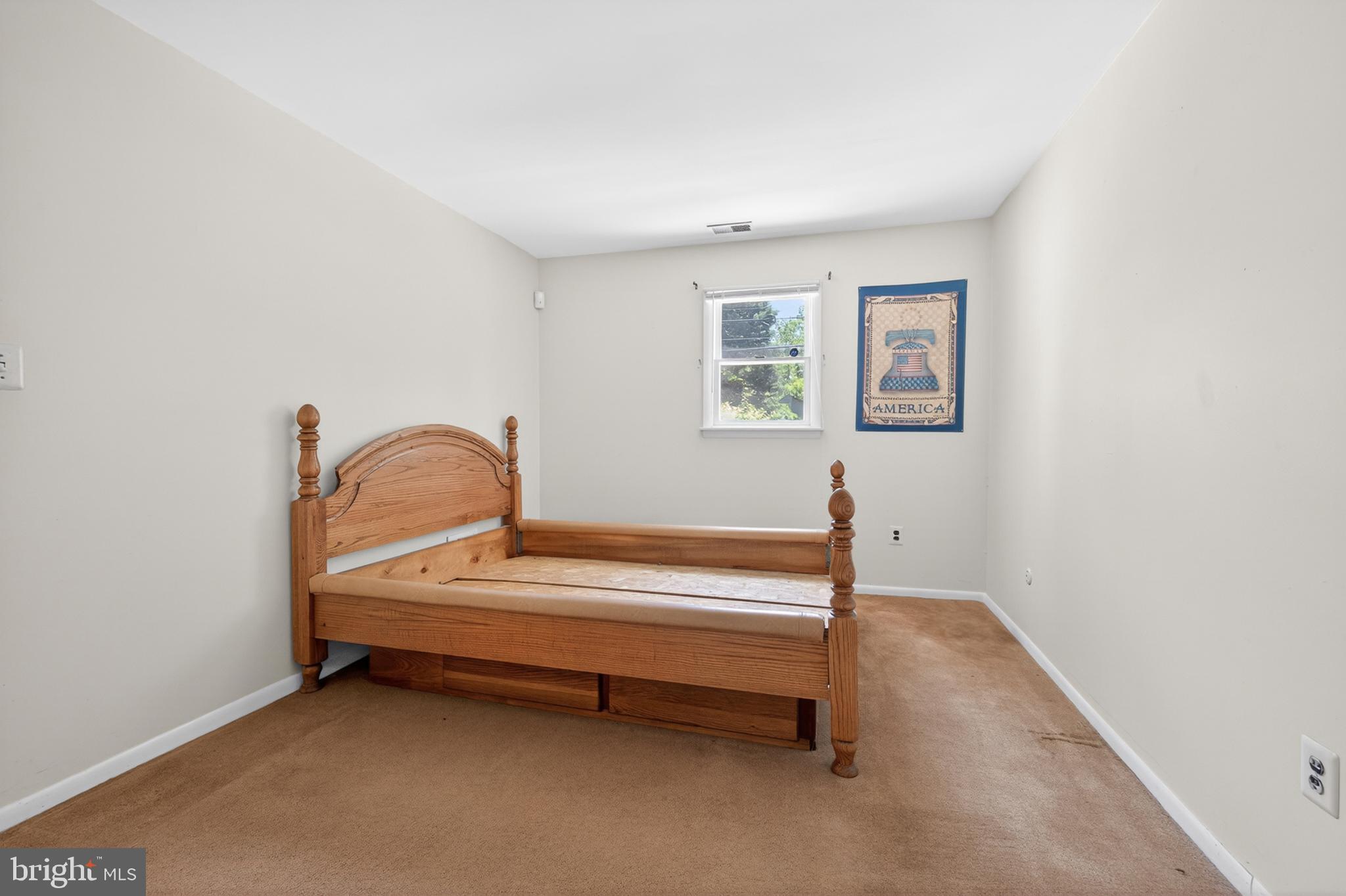 3701 Ebright Road Chadds Ford, PA 19317 - Photo 40 of 45 a bedroom with a bed and a window