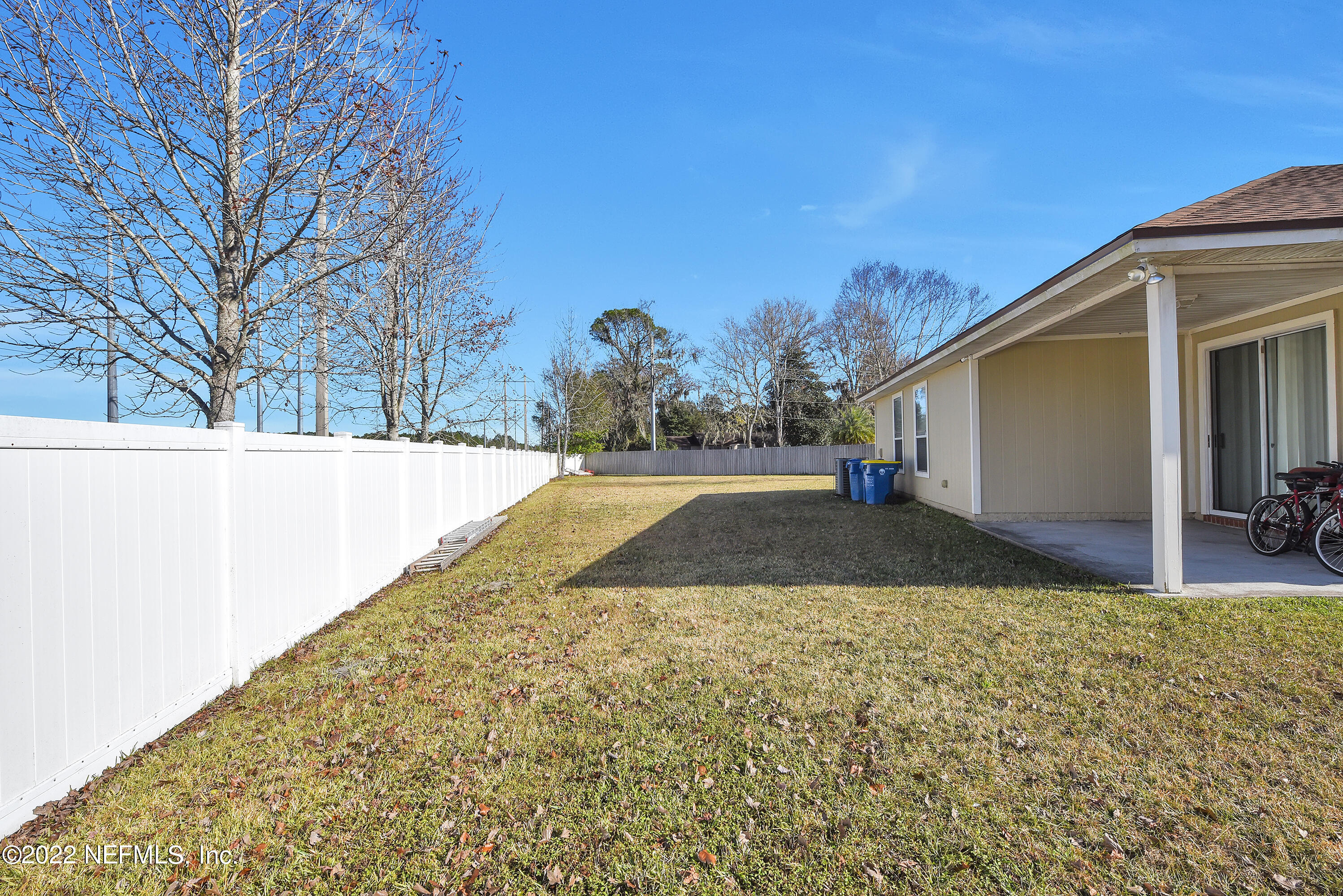 11941 Crooked River Road Jacksonville, FL 32219 - Photo 19 of 28 a view of backyard of the house