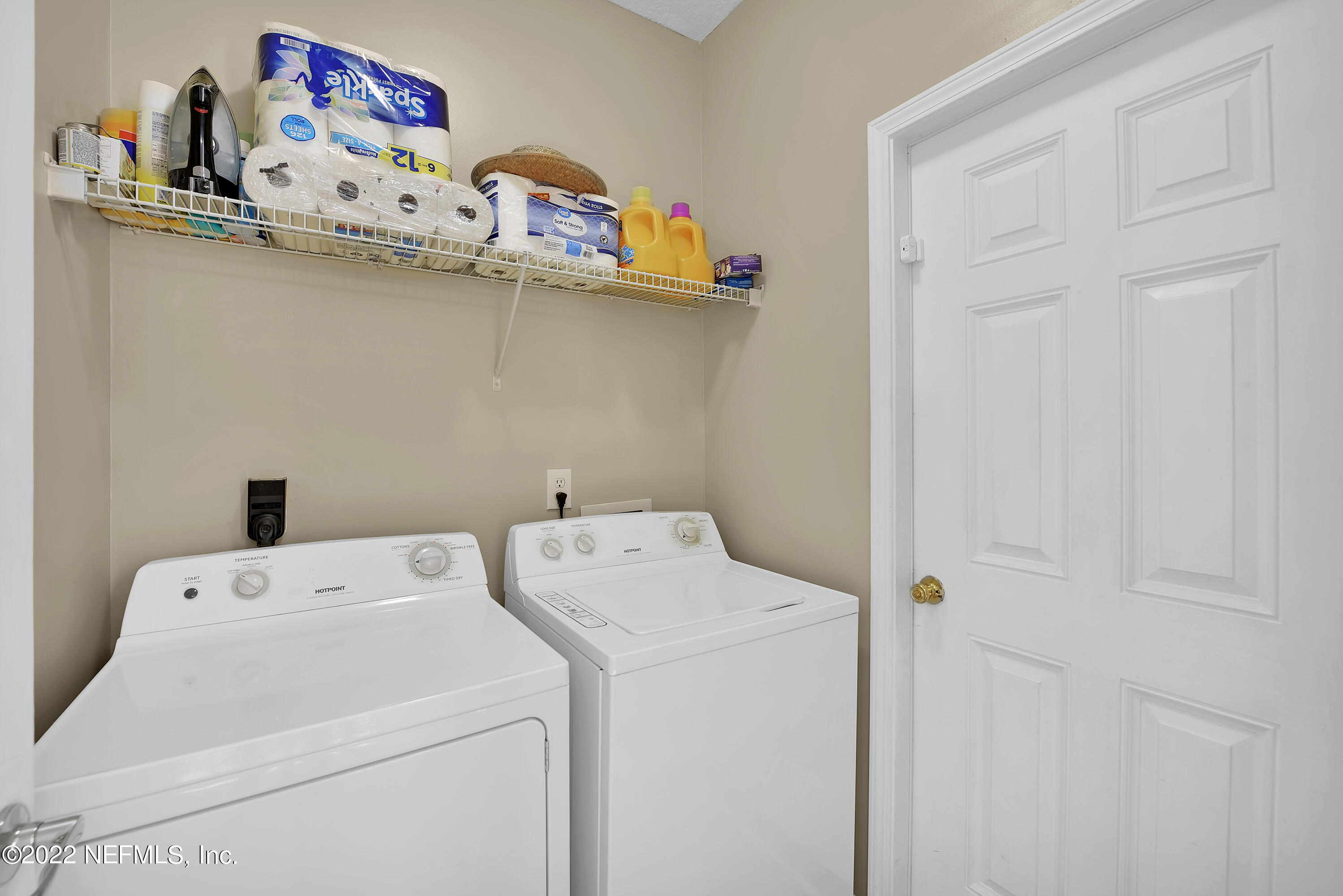 11941 Crooked River Road Jacksonville, FL 32219 - Photo 5 of 28 a utility room with dryer and washer