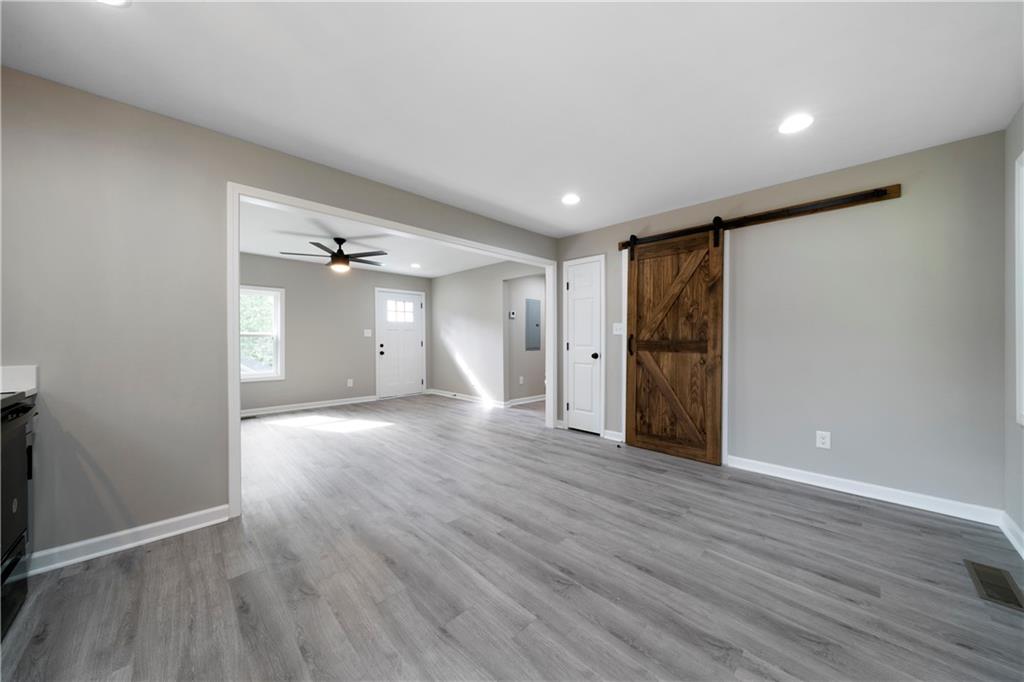 515 Harper Avenue Southwest Rome, GA 30161 - Photo 11 of 17 a view of an empty room with wooden floor