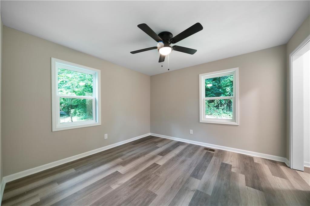 515 Harper Avenue Southwest Rome, GA 30161 - Photo 13 of 17 a view of a ceiling fan and window in a room