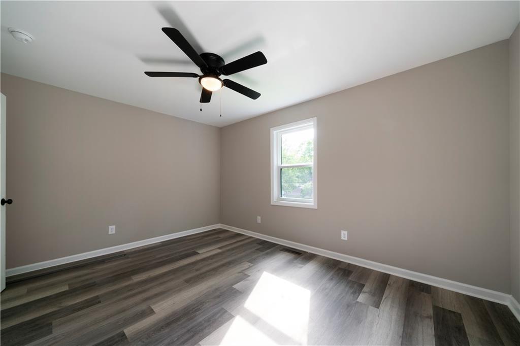 515 Harper Avenue Southwest Rome, GA 30161 - Photo 17 of 17 a view of room with window and ceiling fan