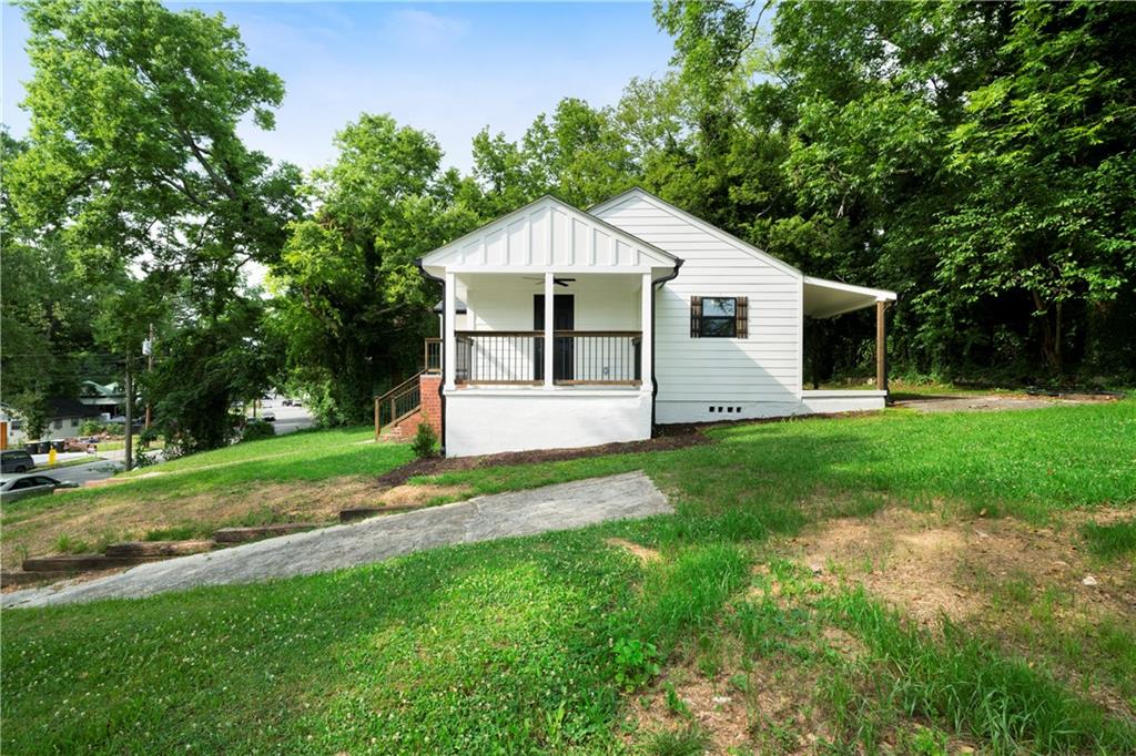 515 Harper Avenue Southwest Rome, GA 30161 - Photo 3 of 17 a view of a house with a yard