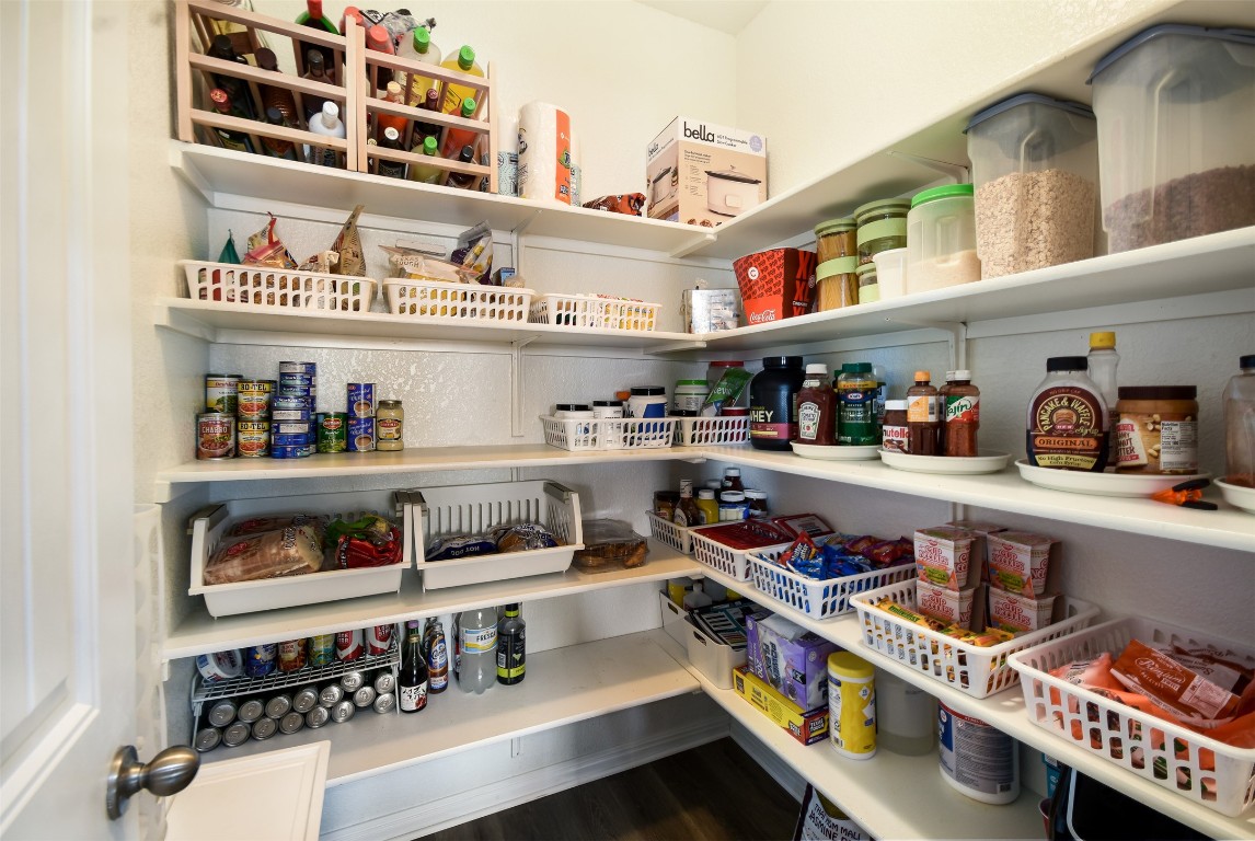 217 Frederick Drive Georgetown, TX 78626 - Photo 10 of 36 a shelf with cup and plates