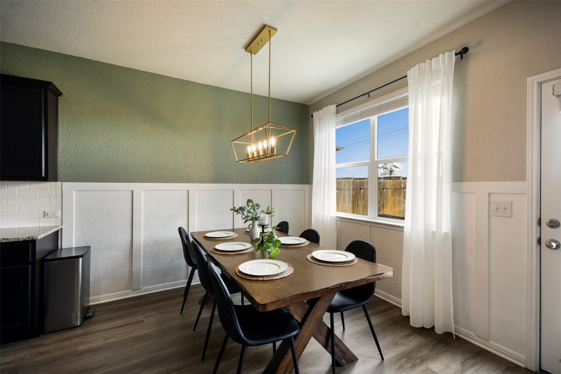 217 Frederick Drive Georgetown, TX 78626 - Photo 11 of 36 a view of a dining room with furniture window and wooden floor
